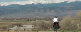Photo of bicyclist in Colorado, NOAA NCEI
