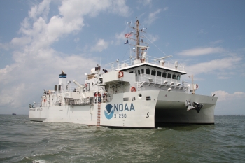 NOAA Ship Ferdinand R. Hassler, a hydrographic survey vessel, gets underway near Norfolk, Va