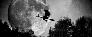 Artwork of a witch flying in front of a full moon