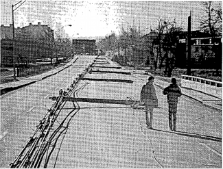 Picture of toppled electrical poles from Chinook wind event of January 1982 in Boulder.
