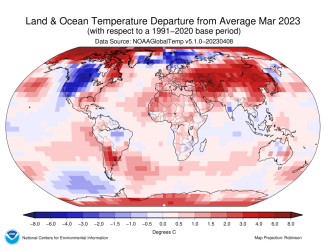 Global map showing land and ocean temperature departure from average for March 2023 with warmer areas colored in gradients of red and cooler areas in gradients of blue.