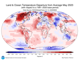 Map of the world showing land/ocean temperature departure from average for May 2023 with warmer areas in gradients of red and cooler areas in gradients of blue.