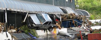 Cars thrown into building by Samoa Islands tsunami