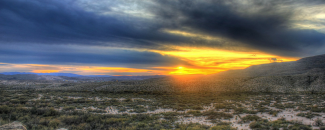 Photo of a sunset over a Texas desert landscape